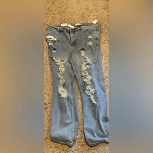 Light blue ripped jeans